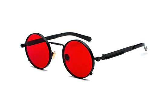Vintage steampunk circular shades by MANDOTOS INTERNATIONAL featuring metal frames and tinted lenses for a retro, stylish look