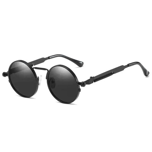 Vintage steampunk circular shades with metal frames and tinted lenses, by MANDOTOS INTERNATIONAL.