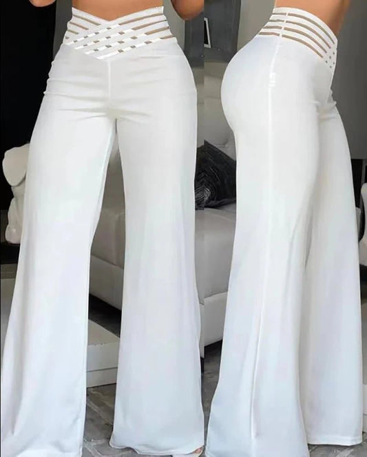 Women flared pants by MANDOTOS INTERNATIONAL featuring high waist, sheer mesh patches, wide leg, perfect for office or casual spring summer.