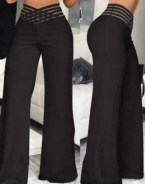 Women flared pants by MANDOTOS INTERNATIONAL featuring high waist, sheer mesh patches, wide-leg style, perfect for office or casual wear.
