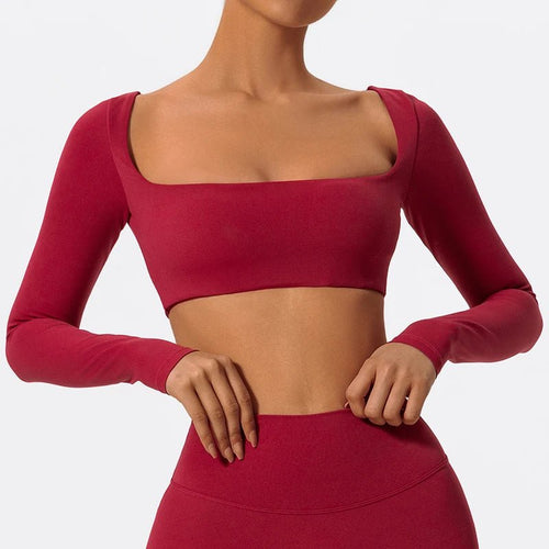 Women's long sleeve fitness T-shirt by MANDOTOS INTERNATIONAL, gym activewear with push-up design, suitable for workout and casual wear.