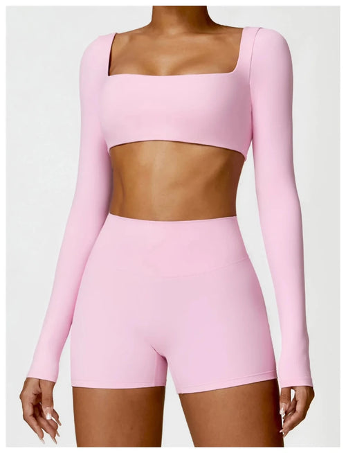 Women's long sleeve fitness T-shirt by MANDOTOS INTERNATIONAL, gym push-up top, lightweight and comfortable for active workouts.