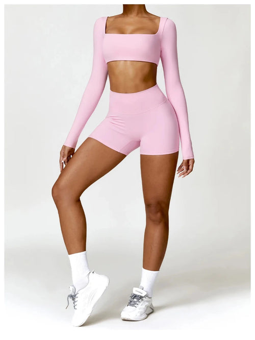 Women's long sleeve fitness T-shirt by MANDOTOS INTERNATIONAL, gym push-up top designed for activewear and workout comfort.