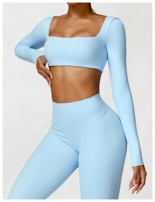 Women's long sleeve fitness T-shirt by MANDOTOS INTERNATIONAL, gym push-up top, made for active workouts and comfortable movement.