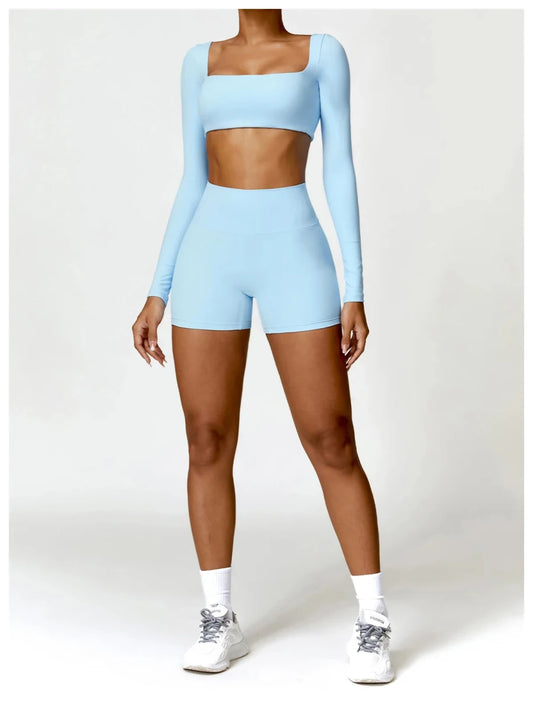 Women's long sleeve fitness T-shirt by MANDOTOS INTERNATIONAL, gym-ready push-up top with comfortable, stretchy fabric for active wear.