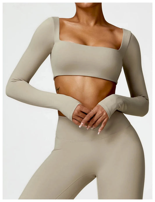 Women's long sleeve fitness T-shirt by MANDOTOS INTERNATIONAL, gym push-up top, athletic wear for active workouts.