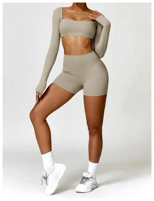 Women's long sleeve fitness T-shirt by MANDOTOS INTERNATIONAL, gym workout top with push-up design, versatile activewear for women.