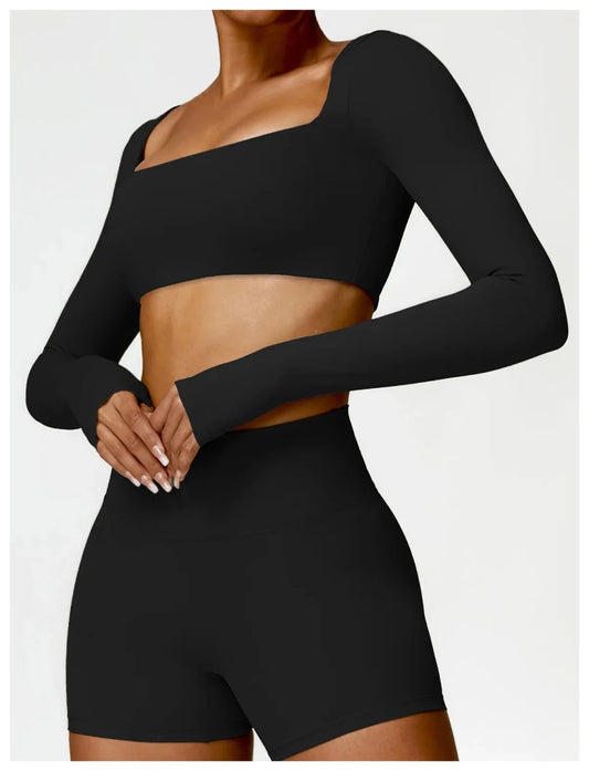 Women's long sleeve fitness T-shirt by MANDOTOS INTERNATIONAL, gym push-up top, designed for active women and comfortable workout wear.