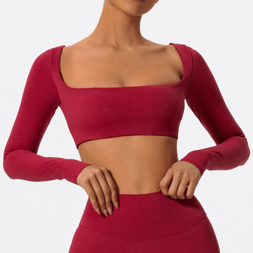 Women's long sleeve fitness T-shirt by MANDOTOS INTERNATIONAL, gym workout top with push-up design, perfect for activewear.