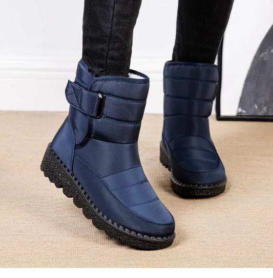 Women's waterproof winter snow boots by MANDOTOS INTERNATIONAL featuring non-slip soles, warm lining, ankle height, and platform style.