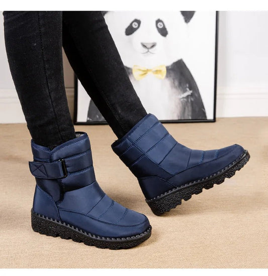 Women's waterproof winter snow boots by MANDOTOS INTERNATIONAL with non-slip soles, warm lining, and platform design.