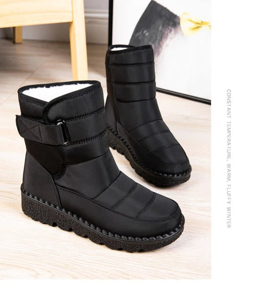 Women's waterproof winter snow boots with non-slip soles, warm platform design, ankle height, from MANDOTOS INTERNATIONAL.