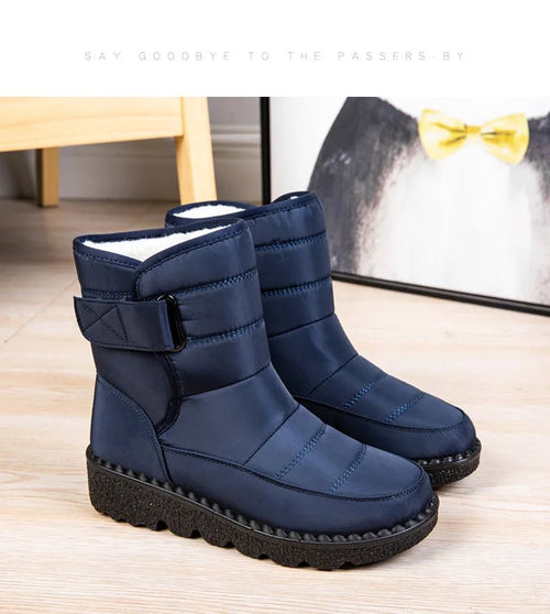 Women's waterproof winter snow boots by MANDOTOS INTERNATIONAL with non-slip soles, warm platform design, ankle height, and durable material.