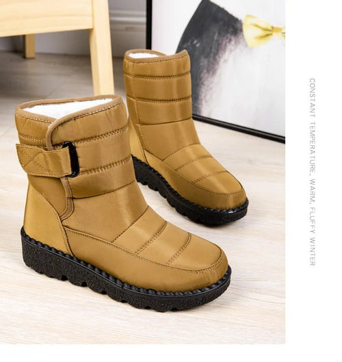 Women's waterproof winter snow boots from MANDOTOS INTERNATIONAL with non-slip soles, warm lining, and platform design for cold weather.