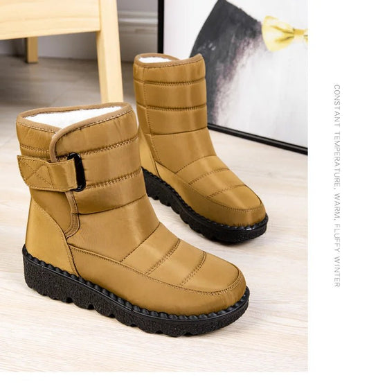 Women's waterproof winter snow boots from MANDOTOS INTERNATIONAL with non-slip soles, warm lining, and platform design for cold weather.
