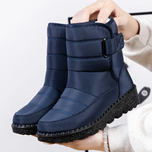 Women's waterproof winter snow boots by MANDOTOS INTERNATIONAL with non-slip soles, warm insulation, and stylish ankle platform design.
