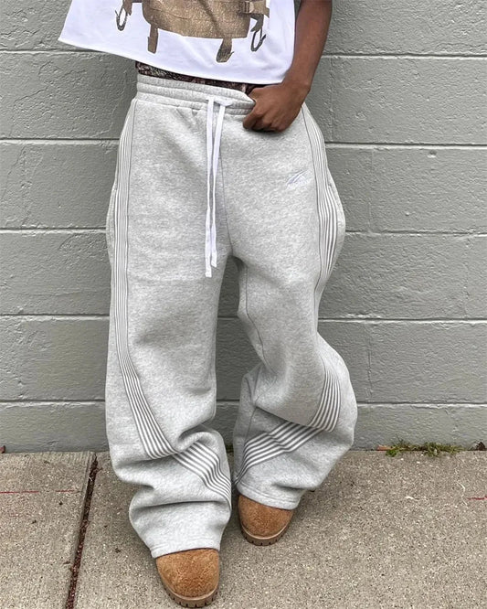 Y2K embroidered black and gray casual tactical jogger pants with camo accents, drawstring waist, for men and women by MANDOTOS INTERNATIONAL.