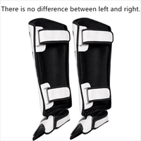 Mandotos kickboxing shin guards and Muay Thai leg protectors, padded and adjustable for martial arts training and competition.