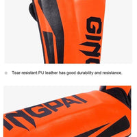 Mandotos kickboxing shin guards for Muay Thai, padded leg protectors for added safety during training and fights.