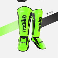 Mandotos kickboxing shin guards and Muay Thai leg protectors displayed, designed for martial arts training and protection.
