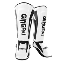 Mandotos kickboxing shin guards and Muay Thai leg protectors showing padded design for impact protection during training.