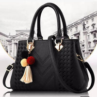 Luxury MANDOTOS women's crossbody handbag with sleek design and spacious interior, perfect for stylish everyday use.