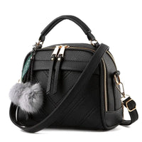 Elegant ladies' luxury leather handbag by MANDOTOS with sleek design and high-quality craftsmanship.