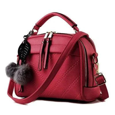 Elegant ladies' luxury leather handbag by Mandotos featuring sleek design and high-quality craftsmanship.