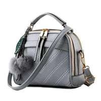Elegant ladies' luxury leather handbag by MANDOTOS with sleek design and high-quality craftsmanship.