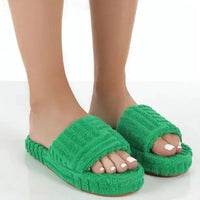 Comfortable ladies' plush slip-on slippers by MANDOTOS, featuring soft material and cozy design for indoor wear.
