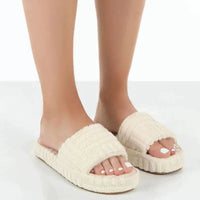Mandotos ladies' plush slip-on slippers with soft, cozy fabric and cushioned soles for comfortable indoor wear.