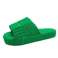 Comfortable ladies' plush slip-on slippers by MANDOTOS with soft interior and cozy design, perfect for relaxing at home.