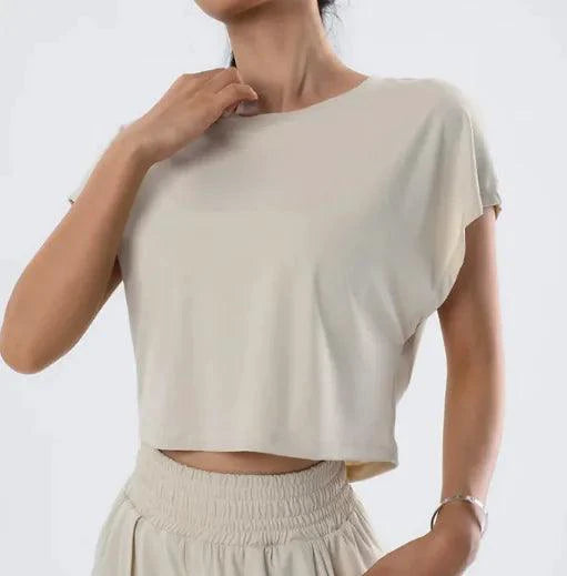 Light pink Ladies' Summer Breeze Tee by MANDOTOS featuring a relaxed fit and short sleeves, perfect for warm weather.