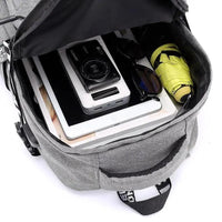 Mandotos laptop backpack with USB charging port, durable fabric, multiple compartments, and padded shoulder straps for comfort.
