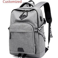 Mandotos laptop backpack with USB charge port, black nylon design, multiple compartments, and padded shoulder straps for travel and work.