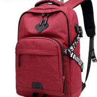 Mandotos laptop backpack with USB charging port, featuring multiple compartments and padded shoulder straps for comfortable carrying.