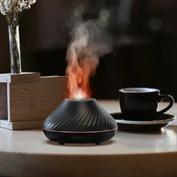 Mandotos Lava Glow essential oil nebulizer with glowing lava lamp design, compact diffuser for aromatherapy and relaxation.