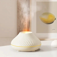Mandotos Lava Glow Essential Oil Nebulizer emitting a soft glow, designed for aromatic mist diffusion and ambiance.