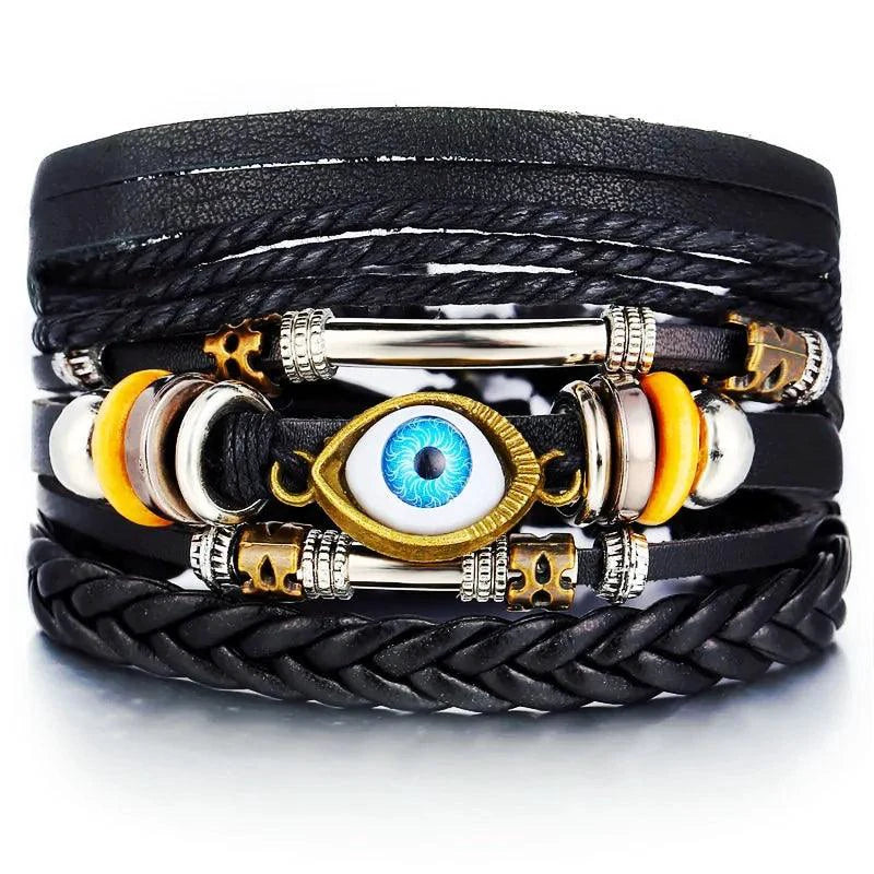 Layered leather charm bracelet by MANDOTOS featuring multiple leather strands and decorative metal charms.
