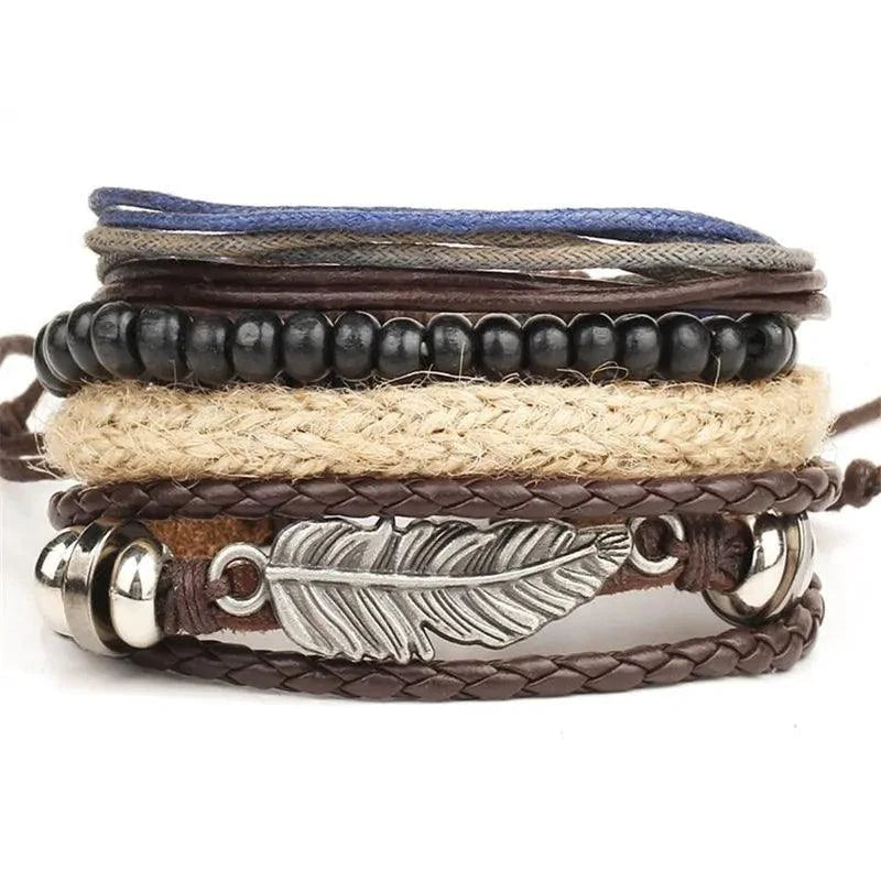 Layered leather charm bracelet by MANDOTOS featuring multiple leather strands and decorative metal charms.