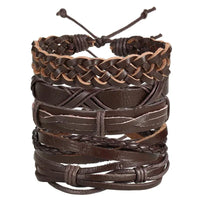 Layered leather charm bracelet by MANDOTOS featuring multiple leather strands and decorative metal charms.