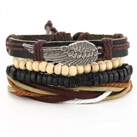 Layered leather charm bracelet by MANDOTOS featuring multiple leather strands and decorative metal charms.