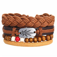 Mandotos layered leather charm bracelet with metal and leather details, stylish accessory for casual or trendy outfits.