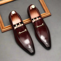 Men's leather loafers by MANDOTOS featuring classic slip-on design, smooth leather finish, and stylish detailing.