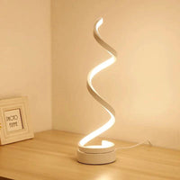 Mandotos LED Elegance Spiral Desk Light with sleek design and adjustable brightness on a modern workspace.