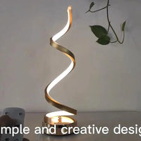Mandotos LED Elegance Spiral Desk Light with sleek, modern design and adjustable arm for focused workspace lighting.