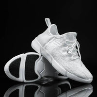 Mandotos LED fiber optic shoes illuminated with colorful light strips, stylish footwear with glowing fiber optic accents.
