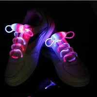 Mandotos LED light-up shoelaces glowing in the dark, colorful and flexible laces for sneakers.