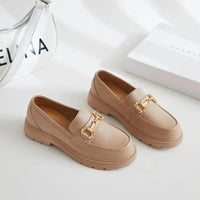 Mandotos women's loafers showing classic slip-on design with stylish black leather finish and comfortable sole.