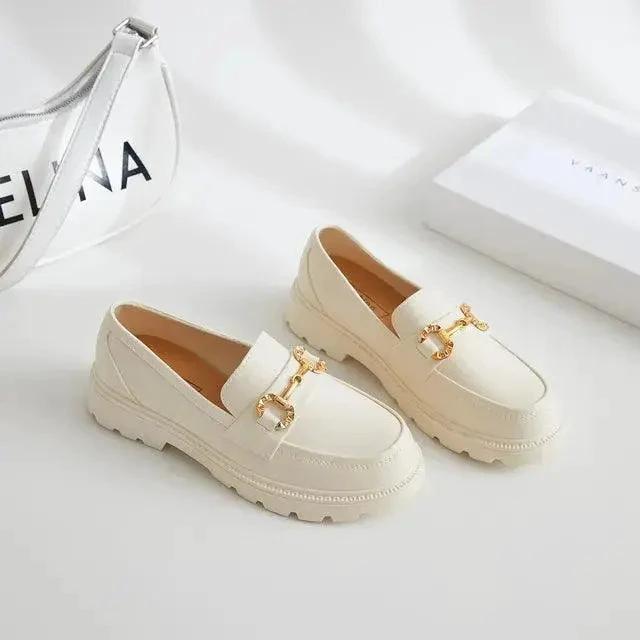 Mandotos women's loafers shoes in classic design, featuring a sleek leather look and comfortable slip-on style.